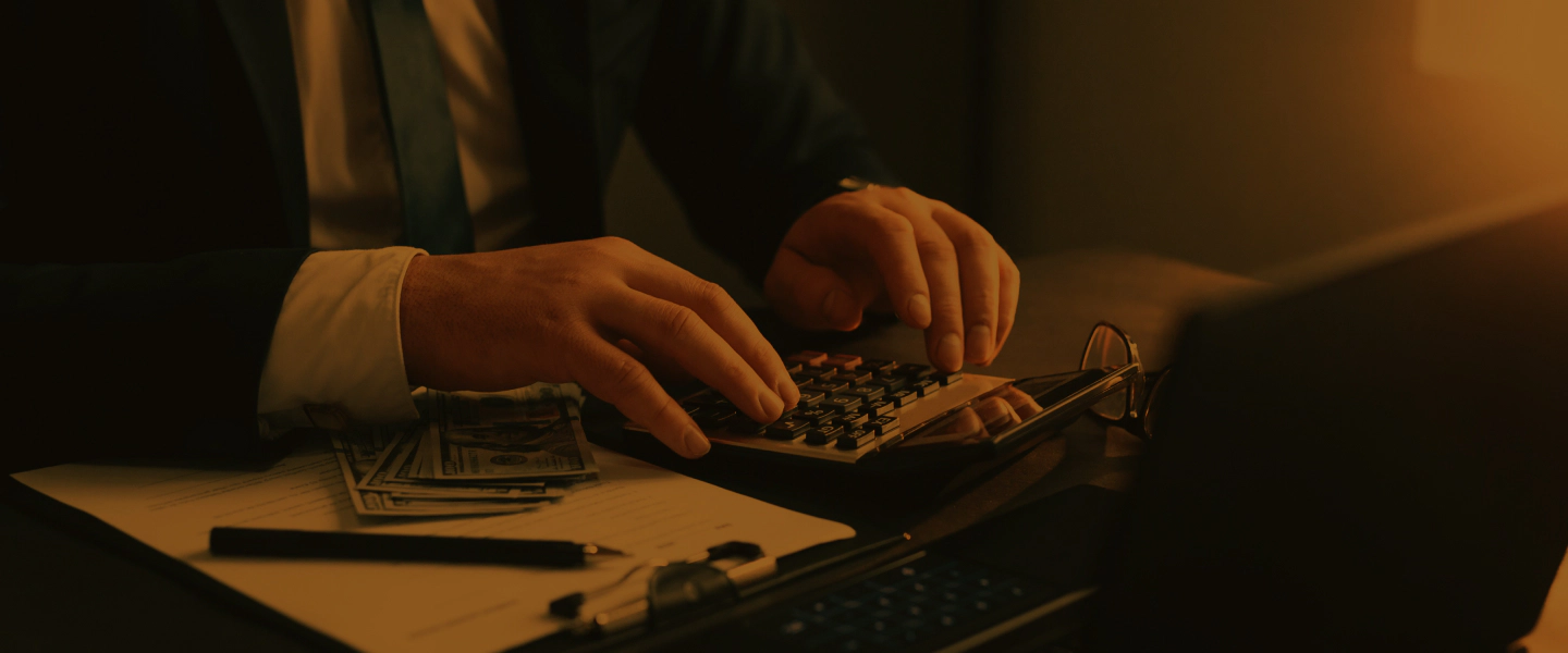 appraiser using a calculator and a laptop 1 visalia ca